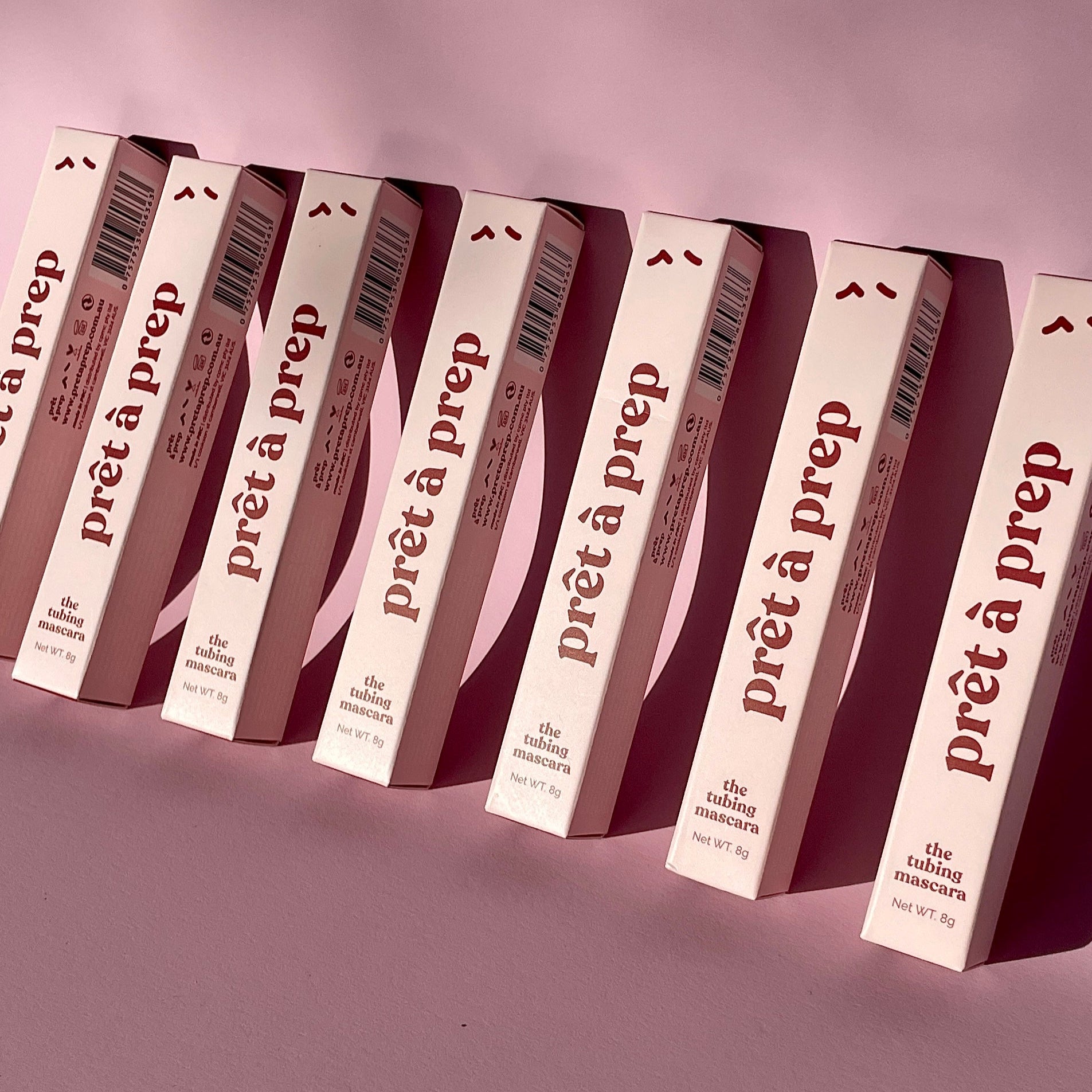 Row of 'pret a prep' boxes on a gradient purple background
