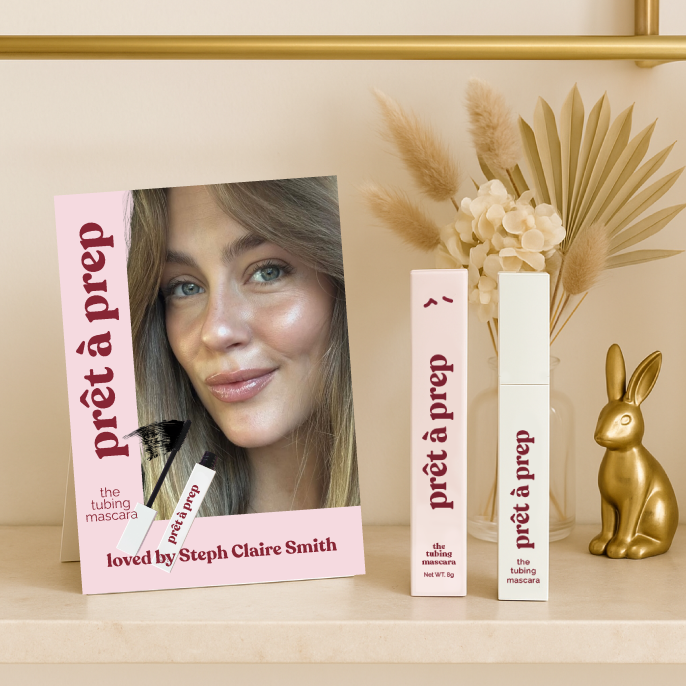 pret a prep mascara packaging with a model's face on a shelf with decorative elements