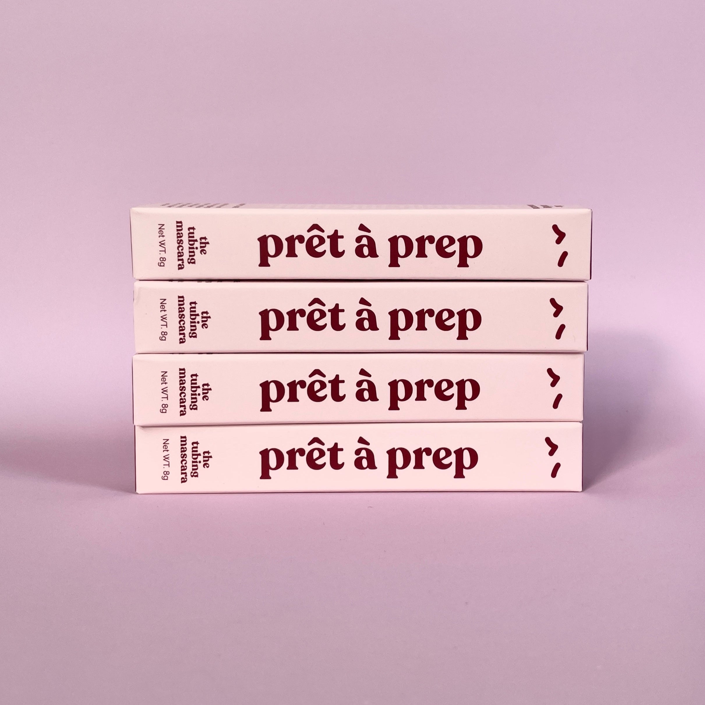 Four boxes of 'pret a prep' on a light purple background